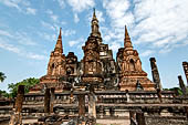 Thailand, Old Sukhothai - Wat Mahathat, the main chedi is composed by a platform with a chedi in the centre, with the characteristic shape of a lotus bud, surrounded by eight smaller chedi at the cardinal points.  